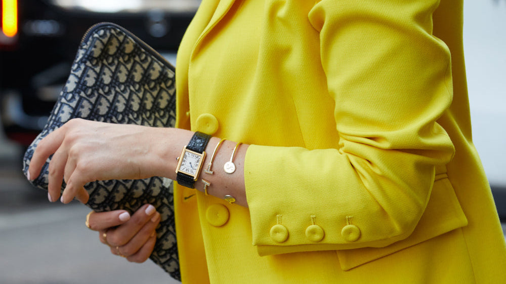cartier tank black and gold
